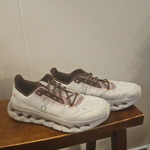 On Running Cream and Brown Athletic Shoes